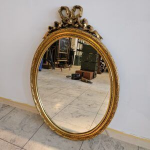 ovalen spiegel met strik